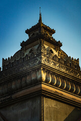 A close-up view of the intricate details on the Patuxai Victory Monument in Laos, showcasing its unique architecture and cultural significance