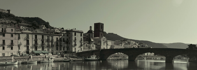 Wide format view of the village Bosa and the bridge over the Temo river. Bosa, Sardinia, Italy 