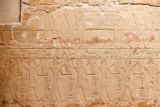 Mural from the mastaba of the Egyptian vizier Mereruka showing funerary procession with men carrying chests and wine