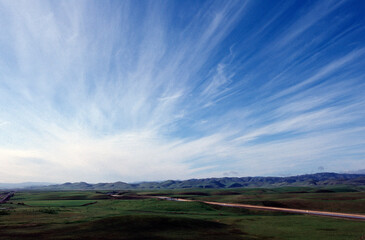 landscape with mountains and clouds