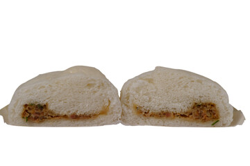 Steamed bun with savory filling, cut in half to reveal its texture and ingredients isolated transparent Background.
