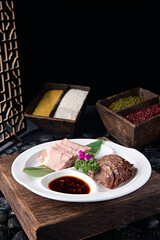 Delicious cold dish with dipping sauce and pressed pork elbow