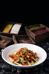 Hunan-style stir-fried pork intestines with rice pepper, garlic sprouts, celery and garlic