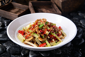 Hunan-style stir-fried pork intestines with rice pepper, garlic sprouts, celery and garlic