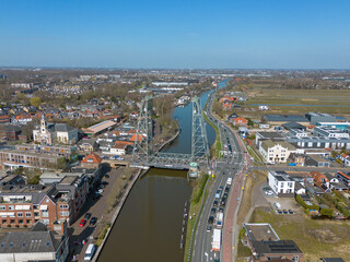 Fototapeta premium Steel vertical lift bridge over the Gouwe canal in Waddinxveen