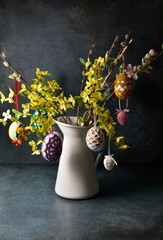 Easter traditional flowers with eggs hang on.