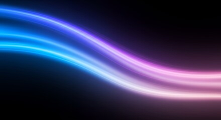 Fototapeta premium Abstract light trails flowing with vibrant blue and purple hues