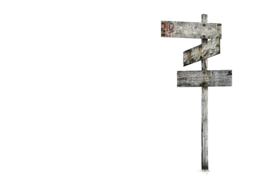 A detailed wooden signpost with old and cracked arrows. A representation of guidance and decision-making