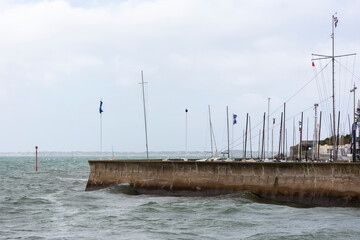 Harbour Wall and a Rough Sea