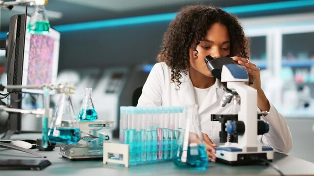African Women Pharmaceutical Scientist Conducting Science