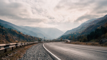 background mountain road and sky with clouds in the afternoon in Georgia