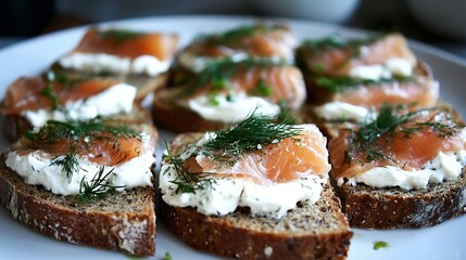 Danish smrrebrd open faced sandwich smoked salmon dill and cream cheese arranged on rye bread