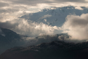 Winter&rsquo;s Embrace: A Misty Valley at Dusk