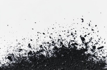 Obraz premium Crushed black material explosion on white background