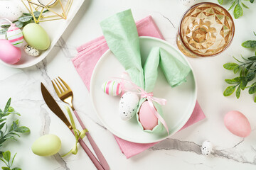 Easter table setting on white background.