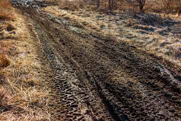 Descent on a dirty dirt road with loose soil