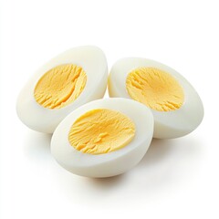 Three halved hard-boiled eggs, close-up, isolated on white.  The yolks are bright yellow and the whites are opaque and firm