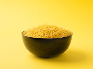 Raw vermicelli, gold soup pasta, small homemade noodles, thin Italy macaroni