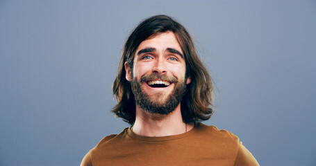 Laughing, joke and portrait of man in studio for comic, funny and silly with mockup space....