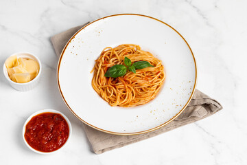 pasta with tomato sauce, parmesan and basil