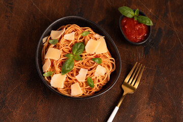 pasta with tomato sauce, parmesan and basil