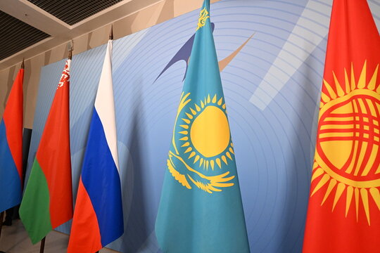 Flags of the Eurasian Economic Union; flags of Russia, Kazakhstan, Armenia, Belarus, and Kyrgyzstan; flags of the CIS; flags; forum; meeting.