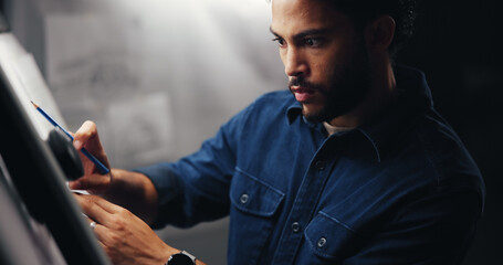 Project, designer or man with eraser for drawing, sketching or editing with artistic skills in office overtime. Deadline, night or illustrator with illustration, industrial craft or creative process