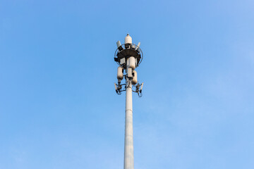 Communication signal tower with blue sky background