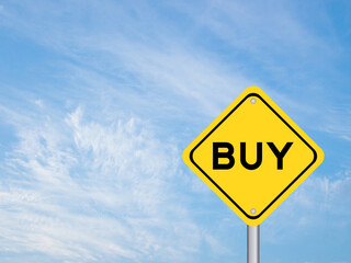 Yellow transportation sign with word buy on blue color sky background