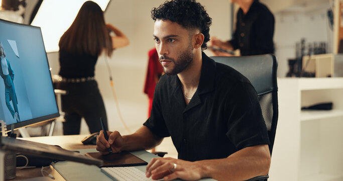 Studio, man and picture editor on computer with post production software for fashion on graphic tablet. Retouching photography, design and creative art for drawing, editing media or serious backstage - Powered by Adobe