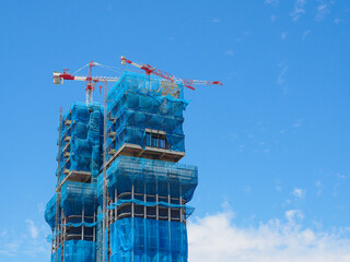 Skyward Ascent: Capturing the Dynamic Symphony of Urban Growth, Steel Giants Rise Amidst...