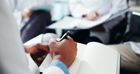 Hands, person and writing on notebook of healthcare training, teaching lesson and study information. Doctor, notes and group of students for medical education, class checklist and feedback of interns