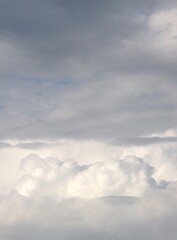 A close-up of the cloudy sky. Color background. Soft shapes. Simple composition. Abstract environment. Atmosphere of presence. Picture. Wallpaper. Poster. Postcard. Place to insert