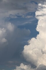 A close-up of the cloudy sky. Color background. Soft shapes. Simple composition. Abstract environment. Atmosphere of presence. Picture. Wallpaper. Poster. Postcard. Place to insert