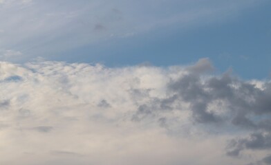 A close-up of the cloudy sky. Color background. Soft shapes. Simple composition. Abstract...