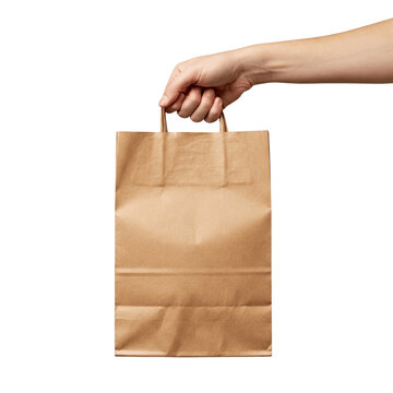 Hand holding kraft paper bag isolated on transparent background, png