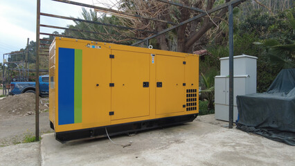 Yellow mobile diesel generator for emergency electrical power.