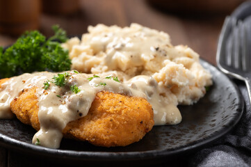Fried chicken cutlets with mashed potatoes and gravy
