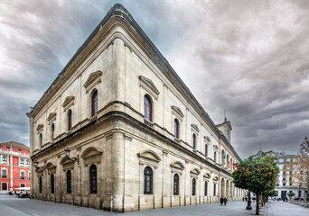 Seville, Spain, Jan 12 2014, Historic City Hall Building on Plaza Nueva in Seville Under Cloudy Skies