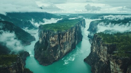 Majestic river canyon,  misty mountains