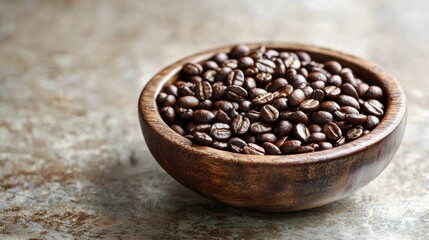 Fototapeta premium A rustic wooden bowl filled with rich brown coffee beans, neatly arranged on a textured wooden surface with copy space.