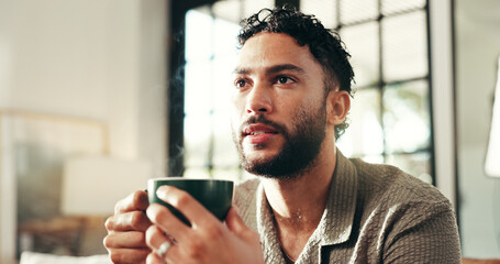 Peace, thinking and coffee with man on sofa in lounge for reflection, calm and caffeine beverage....