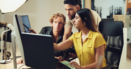 People, computer and teamwork for photoshoot in studio for production results, talking and review. Staff, producer and group to check for fashion photography, magazine catalog and filming process