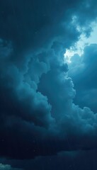 Dark storm clouds gather in the blue sky with heavy raindrops falling, dark, rain, turbulent