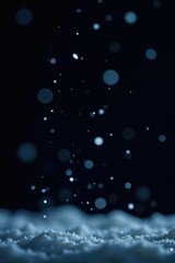 Naklejka premium Sparkling snow flakes fall gently on a pure black background, cold, winter, frosty
