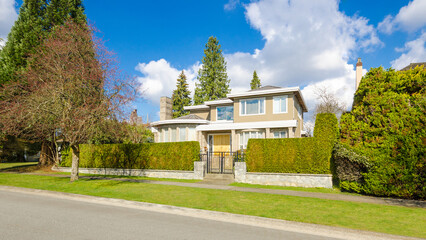 Two story luxury house with beautiful summer  landscape in Vancouver, Canada, North America. Day time on June 2024