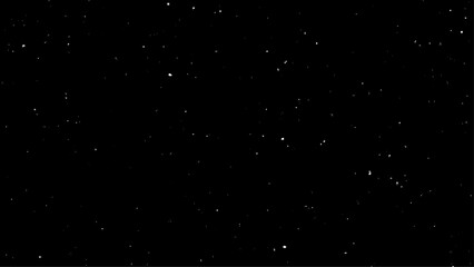 White Snow Falling on Isolated Black Background, Shot of Flying Snowflakes Bokeh, Dust Particles or Powder in the Air. Holiday Overlay Effect