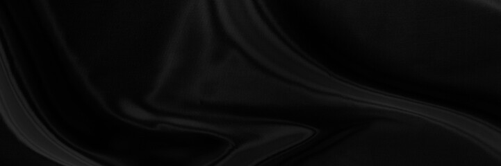 Black gray satin dark fabric texture luxurious shiny that is abstract silk cloth panorama background with patterns soft waves blur beautiful.