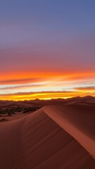 Witness Vibrant Desert Sunset Breathtaking Landscape Of Warm Yellow Orange Hues Over Vast Sand Dune, Displaying Natures Gradient Beauty Sculpted Sand