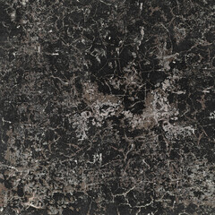 Old black stone cracked wall texture